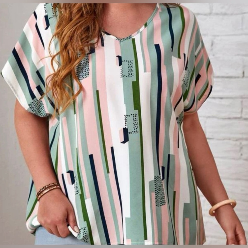 EMERY ROSE V-neck top with batwing sleeves in a combination of colors